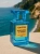 Tom Ford Mandarino di Amalfi – odlewka ekskluzywnych perfum dostępna w Perfame. Orzeźwiający zapach z nutami mandarynki, mięty i bazylii, inspirowany wybrzeżem Amalfi.