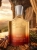 Odlewka orientalnego aromatu Creed Original Santal w ofercie Perfame. Nuty drzewa sandałowego i cynamonu otulają królewskim, rozgrzewającym ciepłem.