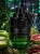 Odlewka dynamicznej kompozycji Spicebomb Night Vision od Perfame. Zielone jabłko i przyprawy lśnią w mroku elektryzującą mocą.